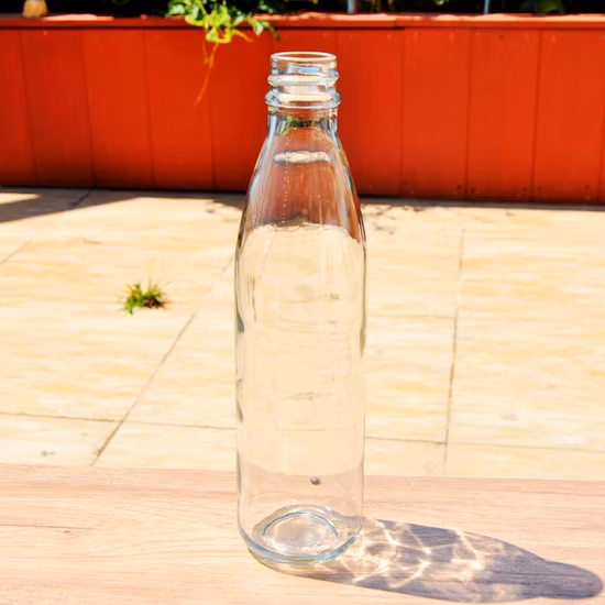 Atacado Bebida Suco de Água Garrafa de Vidro Transparente de Grau Alimentício de 1 L Embalagem Garrafa